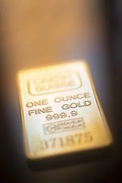 Gold bullion ingot bar Solid pure 999.9 gold bullion ingot bars photo. Cop... Stock Photos