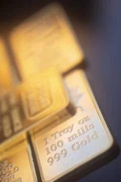 Gold bullion ingot bar Solid pure 999.9 gold bullion ingot bars photo. Cop... Stock Photos