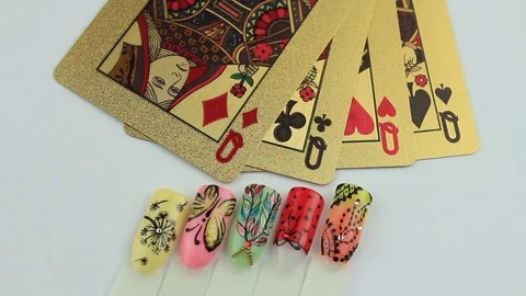 Gold cards and examples of nails Stock Footage 77154276