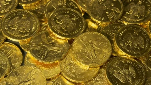 Gold Centenario Coins With Light Change Seamless Loop 스톡 동영상 77778609