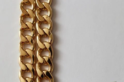 Gold chain on a light background close-up, wealth luxury Stock Photos