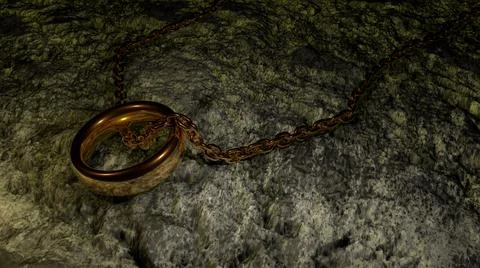A gold chain with a ring on the gray ground at dusk.  Stock Illustration