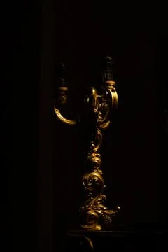 Gold Chandelier inside an empty dark church Foto stock