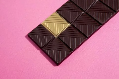 Gold chocolate white background Stock Photos