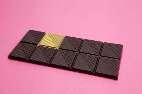 Gold chocolate white background Stock Photos