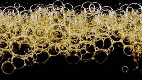 Gold Clear Bubbles Form and Float to Another Ones on Transparent Surface on Stock Footage 270934036