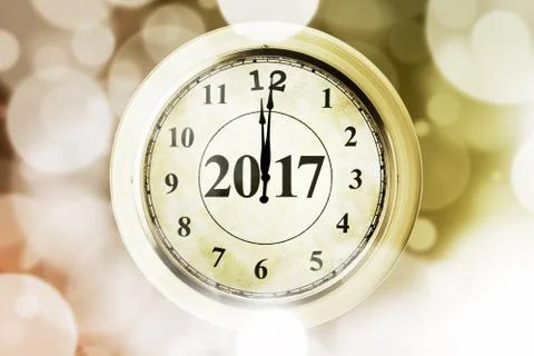 Gold clock and numbers 2017 with glitter Stock Illustration