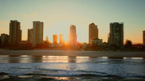 GOLD COAST BEACH DRONE TRACKING SHOT AT SUNSET Stock Footage 87710531