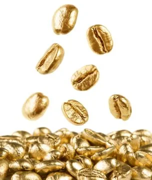 Gold coffee beans falling down Stock Photos