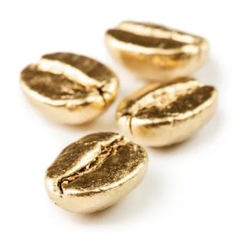 Gold coffee beans Stock Photos