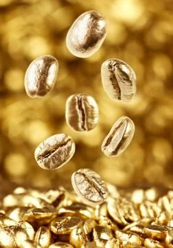 Gold coffee beans Stock Photos