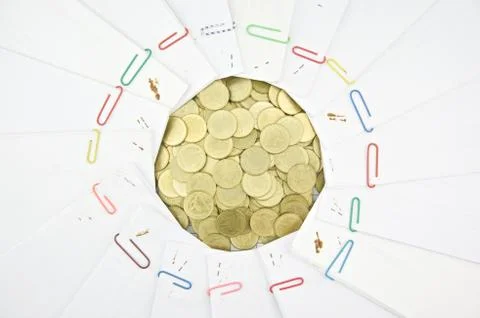 Gold coins on document of account Stock Photos