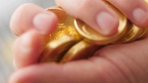 Gold coins on hand Stock Footage 85961848