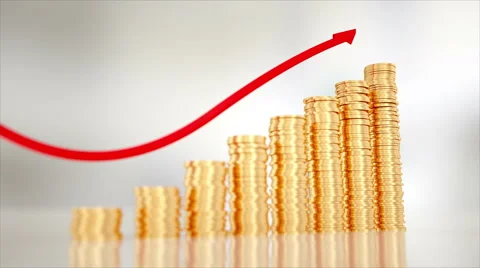 Gold coins stacking up in a column chart style. White background. Stock Footage 67573450