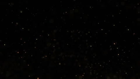 Gold colored flickering loop dots on black background Stock Footage 338409213