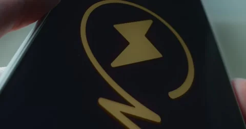 Gold colored lightning bolt symbol, presentation Video stock 313442085