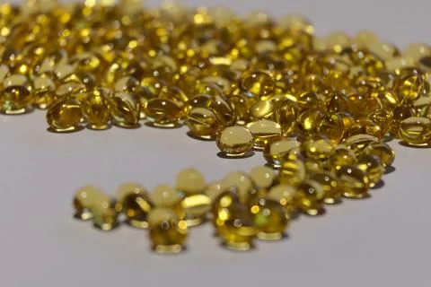 Gold-colored tablets on the table Foto stock