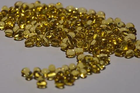 Gold-colored tablets on the table Stock Photos