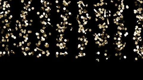 Gold confetti falling against a black surface, celebration party 스톡 동영상 342137930