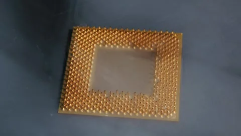 Gold CPU Processor Revealed in Thick Cloud of White Smoke Stock Footage 325806537