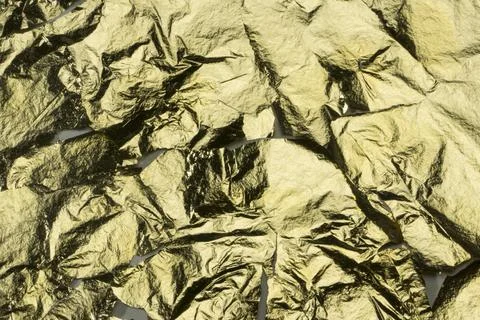 Gold crumpled background  Stock Photos