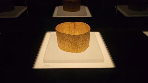 Gold Cuff Seen Close on Lit Plinth, Casa del Alabado, Quito, Ecuador 8K 스톡 동영상 331492975