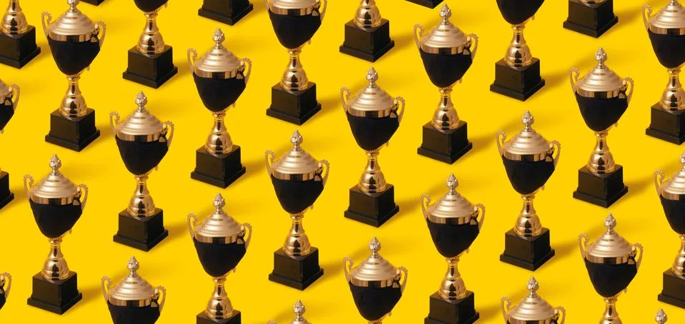 Gold cup in mask pattern Stock Photos