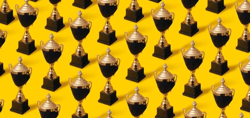 Gold cup in mask pattern Winner gold cup in black protective mask, victory... Stock Photos