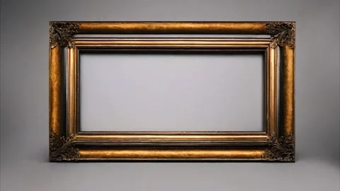 Gold decorated frame with changing lighting angle, dark gray background. Stock Footage 273954677