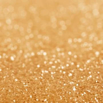 Gold defocused glitter background. Stock Photos