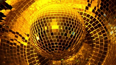 Gold disco mirror ball. Close up sparkly gold disco balls. nightclub party .. Stock Footage 265758490