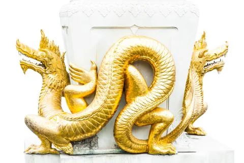 Gold dragons isolated on white Фото
