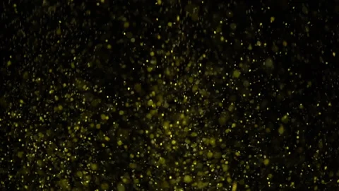 Gold Dust On Black Background Stock Footage 94335176