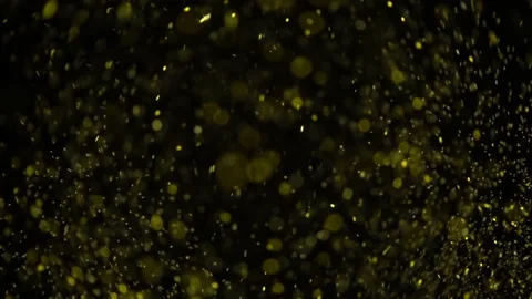 Gold Dust Exploding Stock Footage 94335116