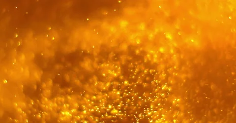 Gold dust particles background loop seamless ready, golden light spot Stock Footage 61376369