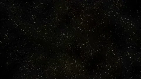 Gold dust particles fly in slow motion in the air lingering slowly. Dust Particl Stock Footage 237677140