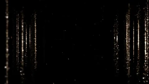 Gold dust particles fly in slow motion in the air lingering slowly. Dust Par Stock Footage 280299483