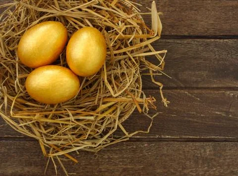 Gold eggs Stock Photos