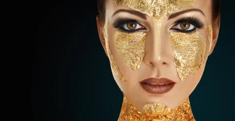 Gold face make-up Stock Photos