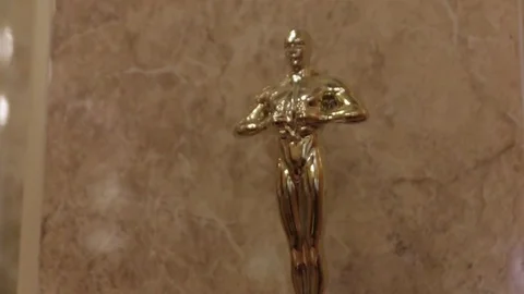 Gold Figurine of Man Stock Footage