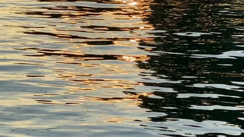 Gold Fire Sunset on Chrome Black Water Split 4k Stock Footage 133464157
