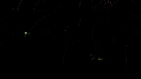 Gold Firework Trails Falling Through Night Sky, 4K Stock Footage 201128321