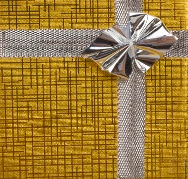 Gold gift as background 스톡 사진