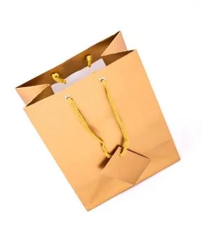 Gold gift bag Stock Photos