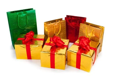 Gold gift boxes and gift bags Stock Photos