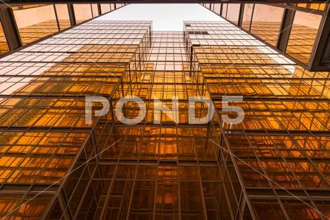 Gold glass mirror of contemporary buildings in Hong Kong, low angle view Stock Photos