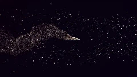 Gold glitter and particles in motion. Christmas gold glitters. Bokeh. 3D glowing Stock Footage 150152047