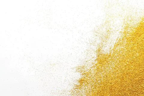 Gold glitter explosion on white background Stock Photos