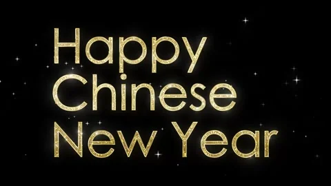 Gold Glitter Text Displaying Happy Chinese New Year Against a Black Backgroun Stock Footage 325950157
