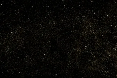 Gold Glitter Texture on Black Background Stock Illustration